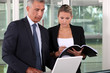 businessman and his young assistant working in the office