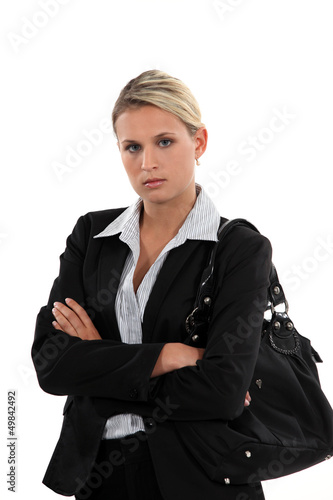 Photo: Unhappy woman arriving at work Unhappy woman arriving at work