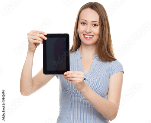 Photo: Woman presenting her digital tablet Woman presenting her digital tablet