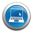 ordinateur portable sur bouton bleu