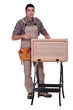 woodworker making a window