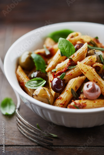 Photo: Penne pasta with dried tomato pesto and marinated olives Penne pasta with dried tomato pesto and marinated olives