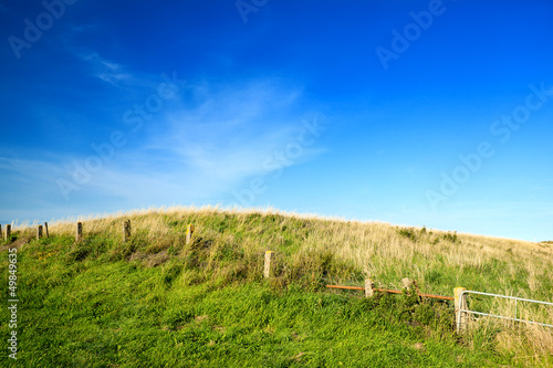 Photo: green hill and blue sky green hill and blue sky