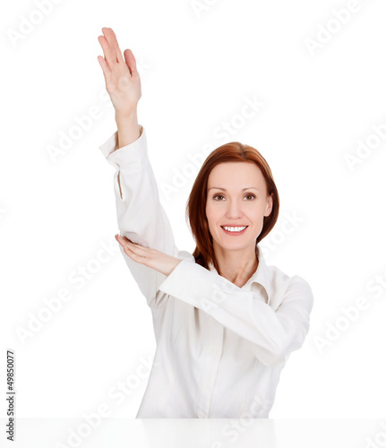 Photo: Woman raising her hand Woman raising her hand