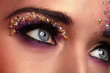 Portrait of beautiful woman with artistic makeup