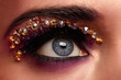 Closeup image of eye with artistic makeup