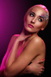 Photo: Portrait of beautiful woman with artistic makeup Portrait of beautiful woman with artistic makeup