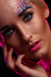 Portrait of beautiful woman with artistic makeup