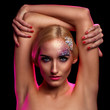 Portrait of beautiful woman with artistic makeup