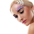 Closeup portrait of beautiful woman with artistic makeup