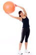 Happy caucasian woman with fitness ball