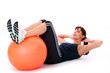 Happy caucasian woman with fitness ball