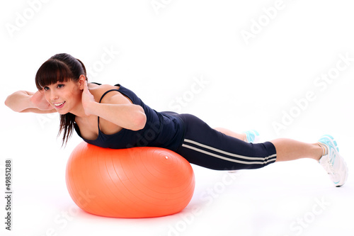 Photo: Happy caucasian woman with fitness ball Happy caucasian woman with fitness ball