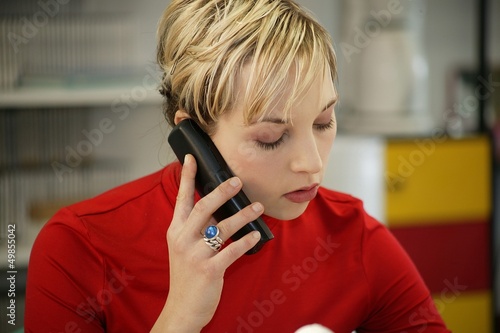 Photo: woman talking on the phone woman talking on the phone