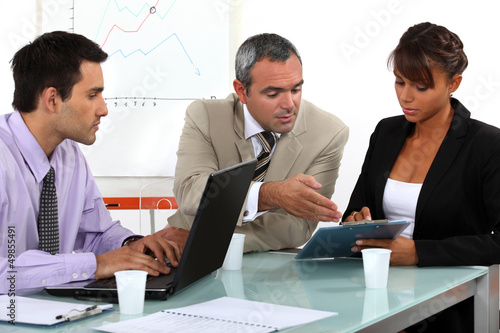 Photo: Colleagues working in an office Colleagues working in an office