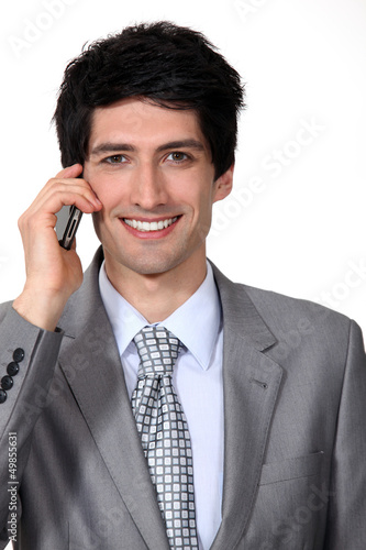 Photo: Black man on the phone Black man on the phone
