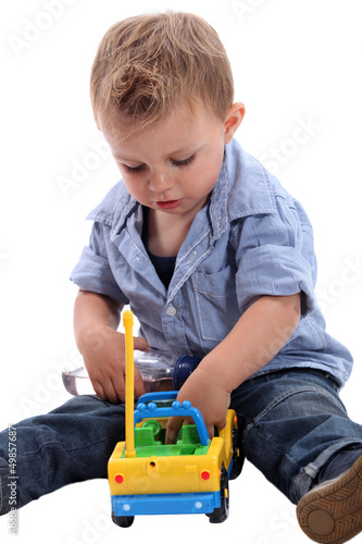 Photo: Baby playing with car Baby playing with car