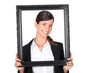 Businesswoman holding picture frame