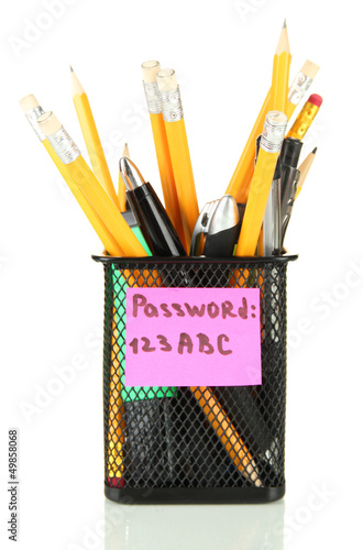 Photo: Password's reminder and office supplies, isolated on white Password's reminder and office supplies, isolated on white