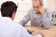 Photo: People playing chess People playing chess