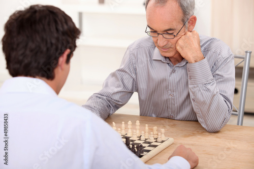Photo: People playing chess People playing chess