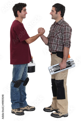 Photo: Two decorators greeting each other Two decorators greeting each other