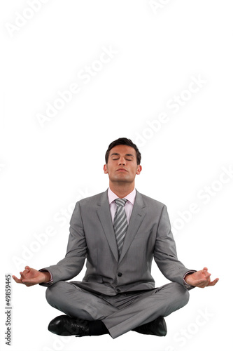Photo: Businessman meditating Businessman meditating
