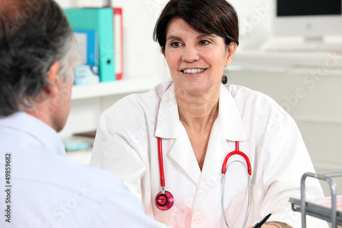 Photo: Doctor talking to a patient Doctor talking to a patient