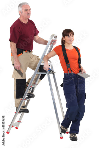 Photo: Tiler and female helper Tiler and female helper