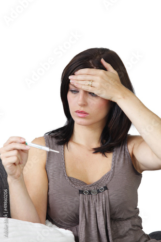 Photo: Shocked woman holding pregnancy test results Shocked woman holding pregnancy test results