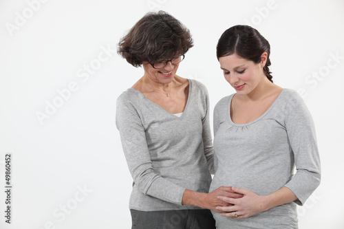 Photo: Pregnant woman with her mother Pregnant woman with her mother