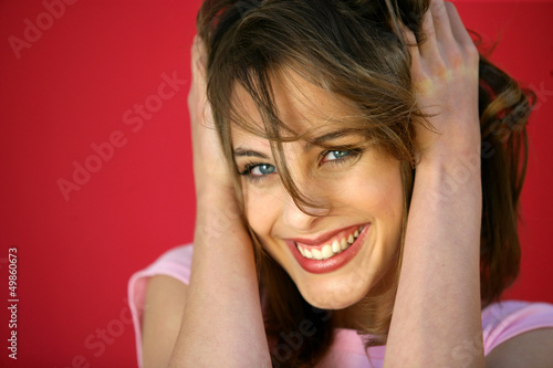 Photo: Young woman with bright smile Young woman with bright smile