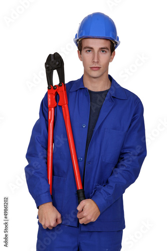 Photo: Male construction worker with bolt cutters Male construction worker with bolt cutters