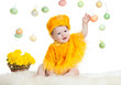 baby boy dressed in Easter chicken costume