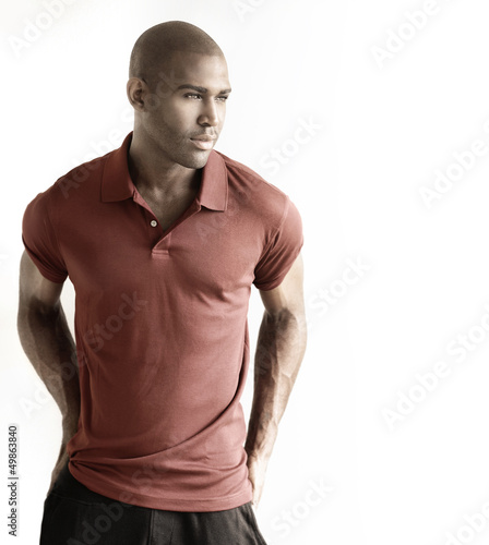 Photo: Male model against white background Male model against white background