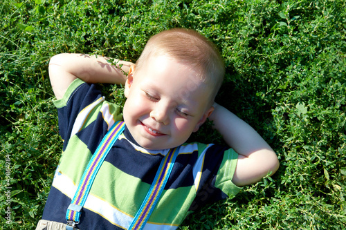 Photo: boy in grass boy in grass