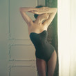 Sensual lady in classical interior