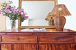 Antique bedside table and luminous shade.