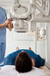 Technician Taking Patient's X-ray