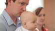 father with baby on Baptism