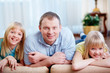 Man with daughters