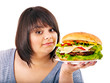 Woman eating hamburger.