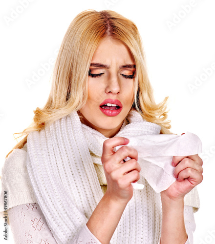 Photo: Young woman with handkerchief having cold. Young woman with handkerchief having cold.