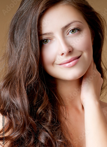Photo: beautiful brunette with perfect hair beautiful brunette with perfect hair