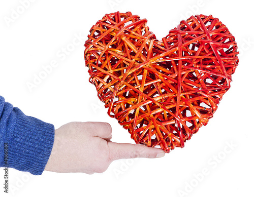Photo: man who maintains a heart twisted with a finger man who maintains a heart twisted with a finger