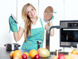 Happy baking cooking woman in her kitchen