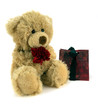 Photo: Teddy Bear holding red flower with gift bag. Teddy Bear holding red flower with gift bag.
