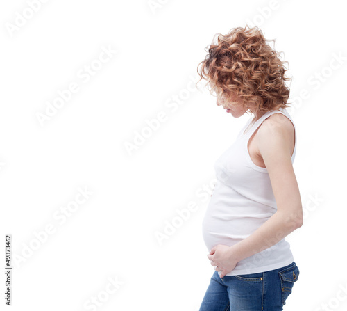 Photo: pregnant woman, side view pregnant woman, side view