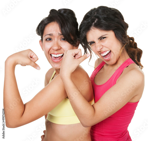 Photo: Confident Fit Women Flexing Confident Fit Women Flexing