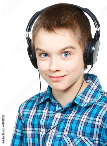 Photo: Kid wearing headphones Kid wearing headphones